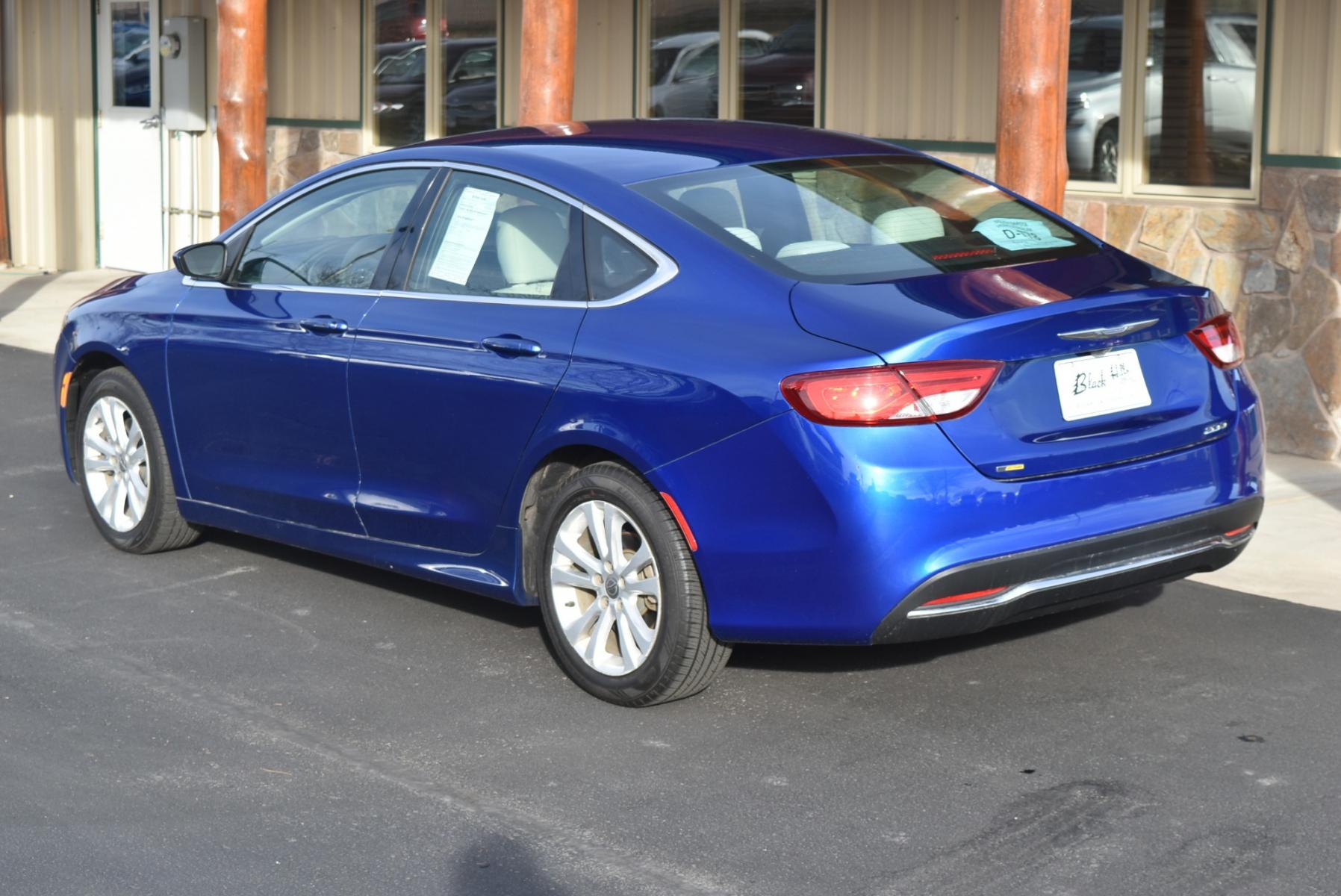 2016 Blue /Beige Chrysler 200 Limited (1C3CCCABXGN) with an 2.4L 4 Cyl Multiair engine, 9-Speed Automatic transmission, located at 1600 E Hwy 44, Rapid City, SD, 57703, (605) 716-7878, 44.070232, -103.171410 - Photo #5